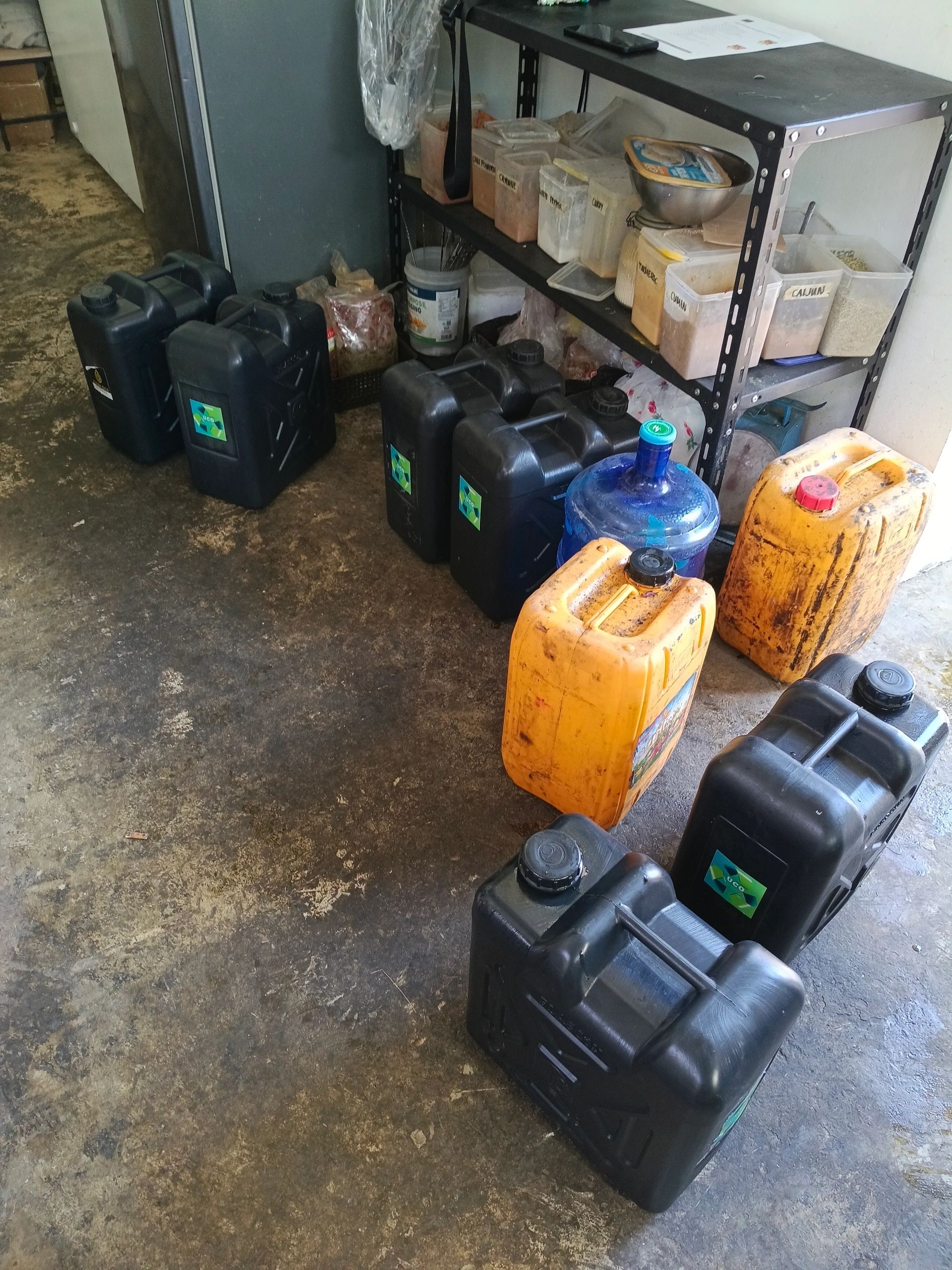 Old and new oil containers ready for collection